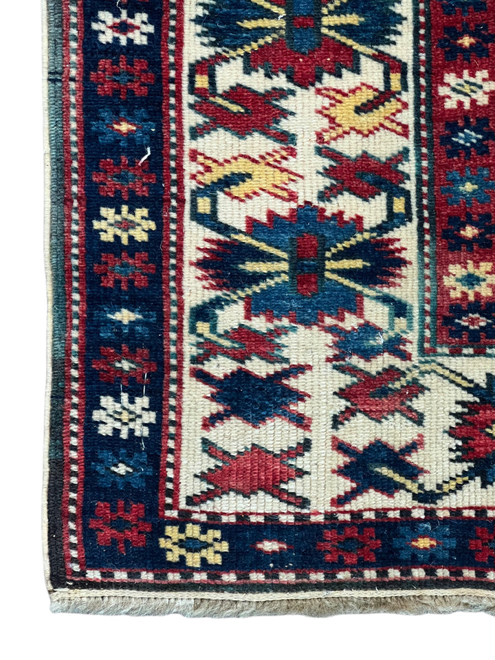 Ivory, Navy &amp; Red Russian Caucasian Style Rug – Circa 2000 – 4’6” x 6’1”