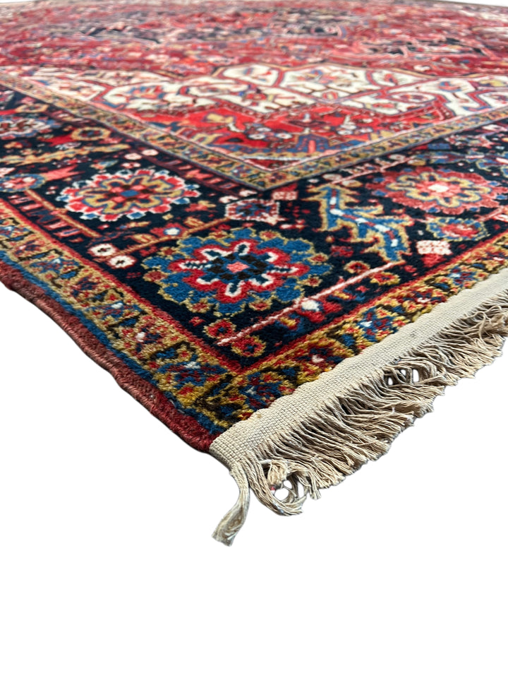 Red &amp; Navy Heriz Rug with Geometric Medallion – 9’9” x 12’9”