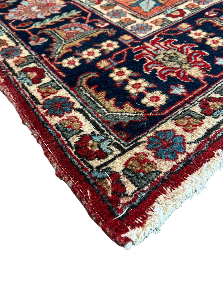 Rust &amp; Navy Floral Heriz Rug – Circa 1920 | 7’0” × 10’4”
