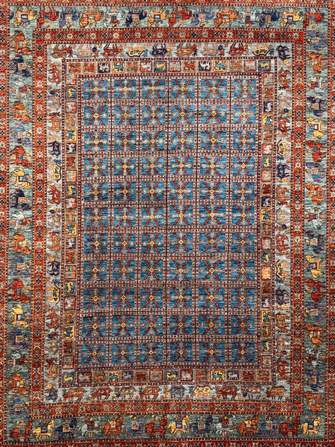 Blue &amp; Rust Pictorial Grid Rug with Horse Motifs – 9’0” × 11’9”