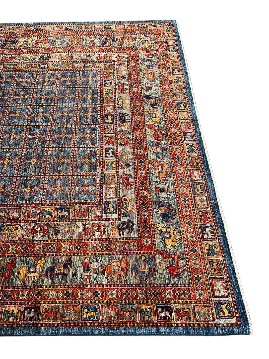 Blue &amp; Rust Pictorial Grid Rug with Horse Motifs – 9’0” × 11’9”