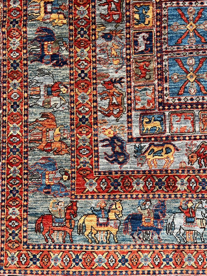 Blue &amp; Rust Pictorial Grid Rug with Horse Motifs – 9’0” × 11’9”
