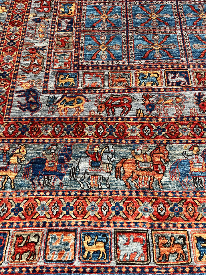 Blue &amp; Rust Pictorial Grid Rug with Horse Motifs – 9’0” × 11’9”