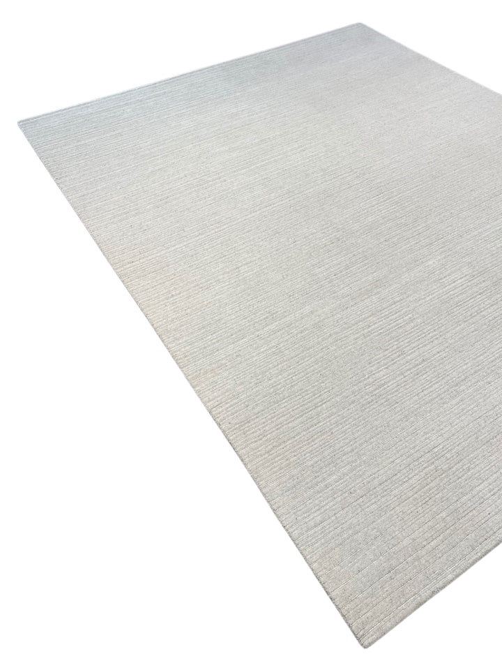 Ivory Whisper - Ivory White Textured Modern Rug – 8’1” x 10’0”