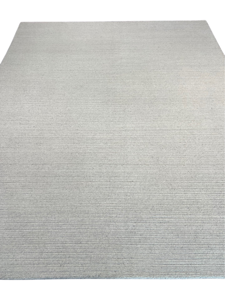 Ivory Whisper - Ivory White Textured Modern Rug – 8’1” x 10’0”