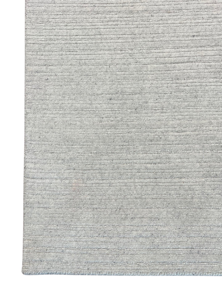Ivory Whisper - Ivory White Textured Modern Rug – 8’1” x 10’0”
