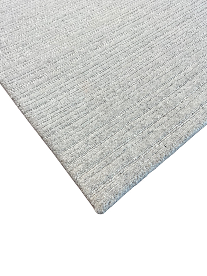 Ivory Whisper - Ivory White Textured Modern Rug – 8’1” x 10’0”